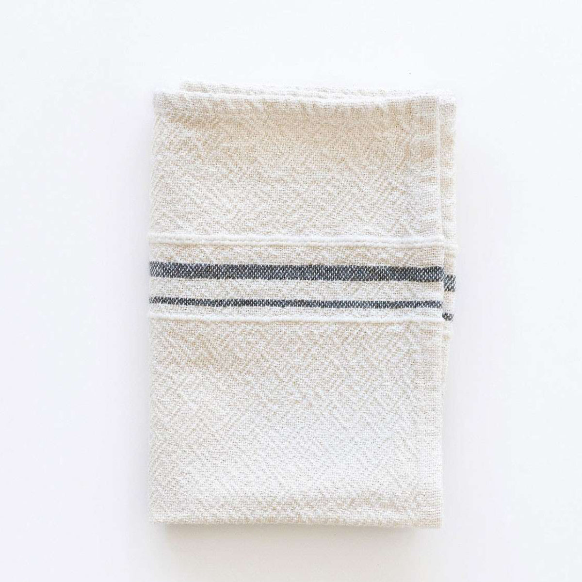 Textured towel with a striped pattern on a white background
