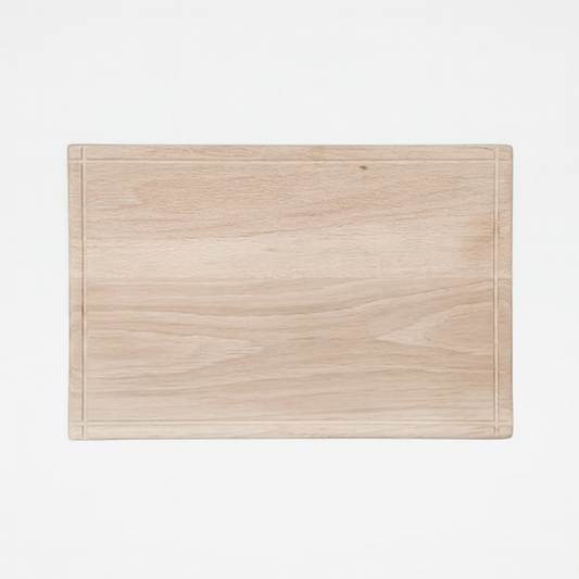 Oak wood cutting board on a white background