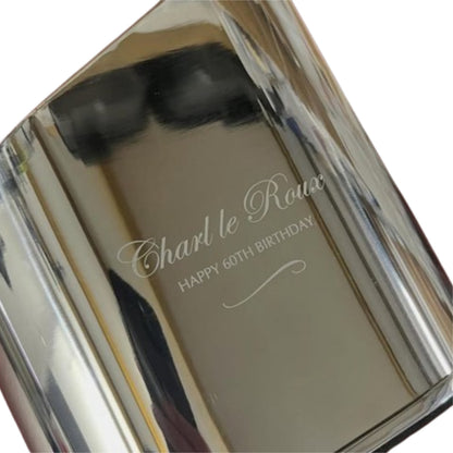 Stainless steel wine bottle cooler with custom laser engraving on it.