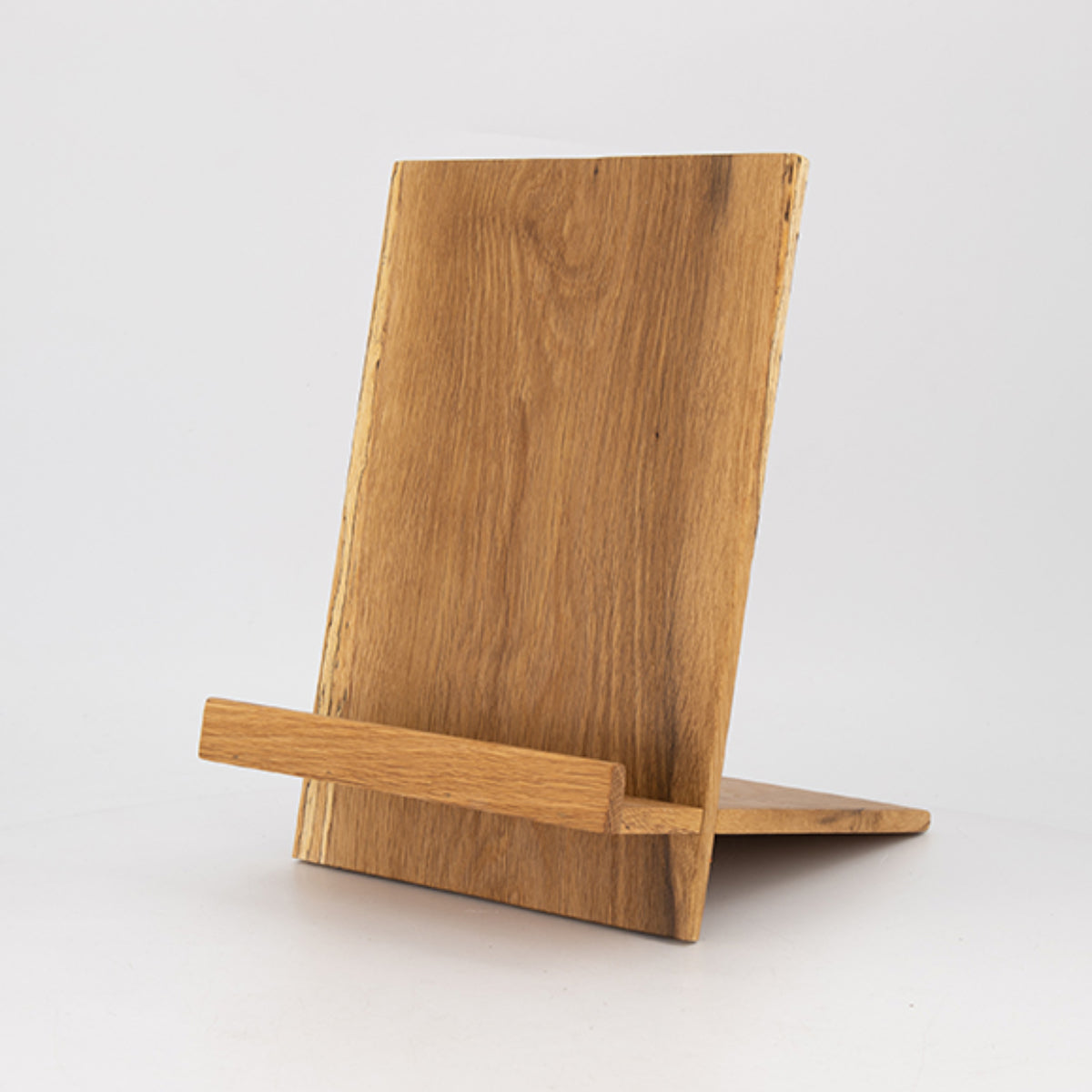 Oak cookbook stand on white background.