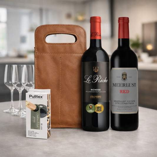 Two bottles of red wine, a brown leather bag, and a box of Pultex products on a table.